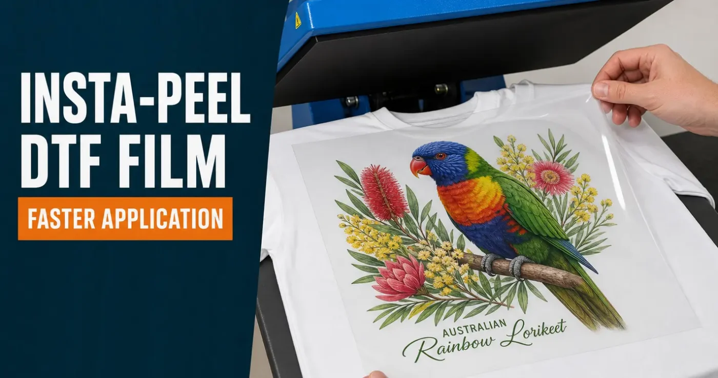 Insta-Peel DTF film being peeled from a white t-shirt on a George Knight heat press, revealing a rainbow lorikeet print