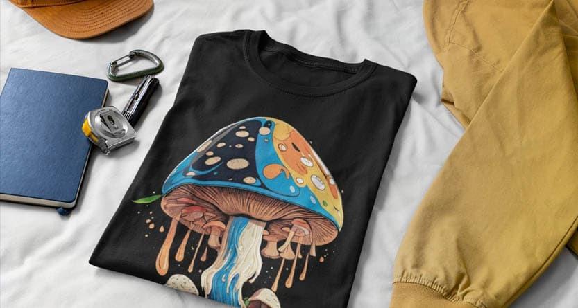 Black T-shirt folded showcasing a psychedelic mushroom graphic, representing DTF transfer printing.
