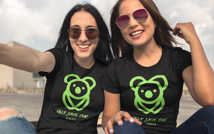 Two women wearing DTF Transfers with 'Save our Koalas' message for September Newsletter 2023.